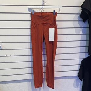 Lululemon Power Thru HR Leggings in Rust. Tight, 25” length size 2.